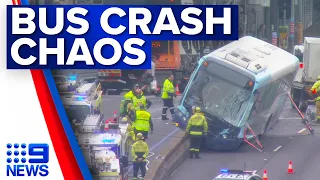 ‘Never seen anything like it’: Bus stuck on concrete barrier after Sydney crash | 9 News Australia