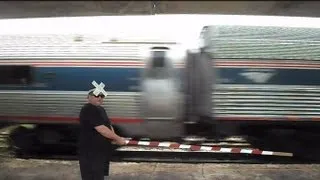 Amtrak Train Goes Through Human Railroad Crossing Gate