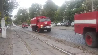 5 fire trucks with lights & sirens arrived at the same time to fire