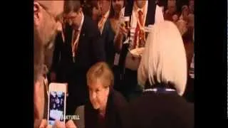 Waiter Spills Beer on German Leader Angela Merkel