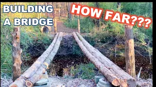 WOW!! BUILDING BRIDGE ACROSS  CRAZY CREEK...HOW FAR??