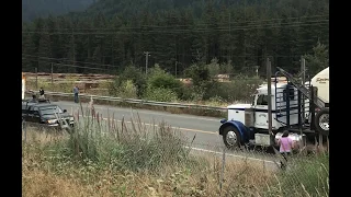 Raw: Log truck rams through protestors holding banner at HRC mill, nearly mowing people down