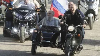 Putin rides with Russian bikers in Crimea