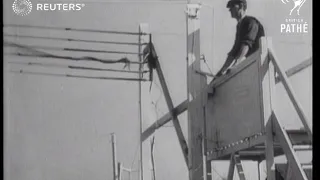 Preparing the Grand National course for steeplechase (1946)