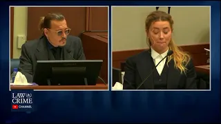 Amber Heard holding back a laugh in court | Johnny makes Amber laugh