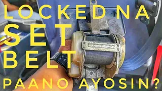 Paano ayosin ang nag lock na Set Belt