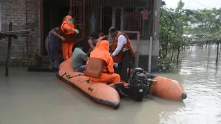 India's rescue teams face double challenge in Assam floods operations | AFP