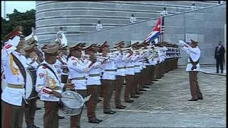 Obama and Castro shake hands in president's historic visit