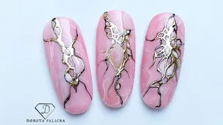 Pink marble nail art with transfer foil and liquid stones, gel polish nail art