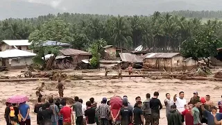 A caminho do Vietname, Tembin passa a tufão