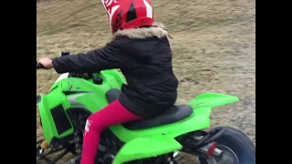 Kawasaki kfx90 big bore 9 year old girl rides atv for first time