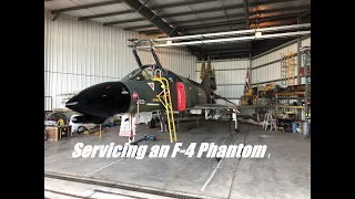 Servicing an F-4 Phantom