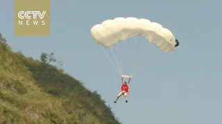 French athlete wins international BASE jumping competition in southwest China