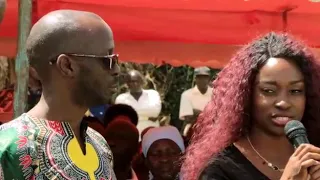 Luo girl from America speaking at a funeral in Kenya