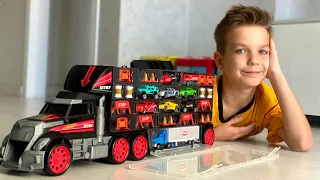 Truck with Toy Vehicles inside. Mark helps mom