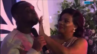 Joe Mettle kis.ses wife...hits the dance floor with wife at their wedding reception