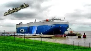 DIONYSOS LEADER  IMO 9426350 Emden Germany car carrier seabound with tugs Autotransporter