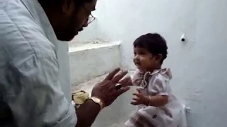 baby arguing with grandfather (try not to aww)