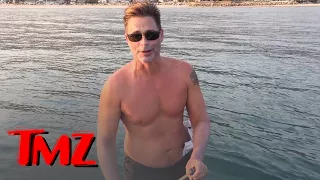 Rob Lowe Paddleboards with 2 Great White Sharks!!! | TMZ