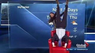 Handstand time! Weatherman Mike Sobel performs handstand live on air