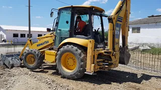 Komatsu WB97R 5 working