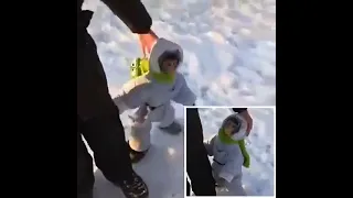 Baby monkey see snow first time