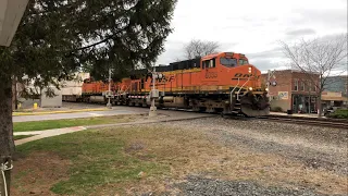 Fast NS intermodal train with two BNSF Locomotives in vermilion Ohio