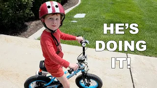 LEARNING TO RIDE A BIKE WITH NO TRAINING WHEELS