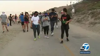 Community runs in solidarity after racist rant at Dockweiler State Beach