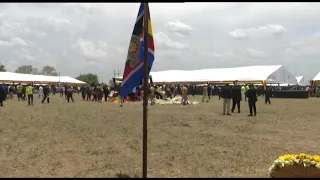 Wind blows Jacob Oulanya's coffin tent during burial. Shocking video