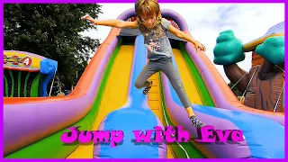 Eva play with inflatable trampoline on the Farm festival