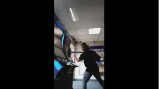 Angry Guy smashing slots machines after losing 1000 pounds