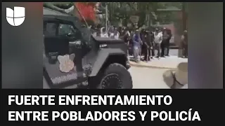 El momento en que vehículo oficial irrumpe en el Congreso de Guerrero durante una violenta protesta