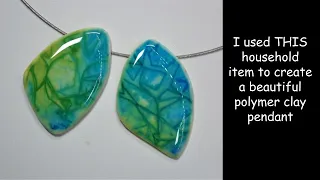 I used THIS household item to create a beautiful polymer clay pendant!