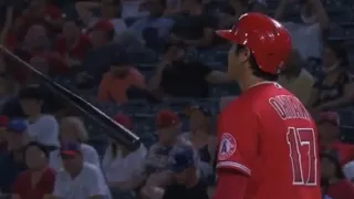 Ohtani bat flips on intentional walk, dodges initial tag going home
