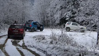 Suzuki S-Cross, Ignis & Grand Vitara on mountain trails. Predelus mountain pass in early winter.