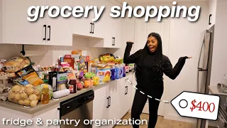 GROCERY SHOPPING FOR MY NEW APARTMENT! huge haul + fridge & pantry organization | moving series ep 4