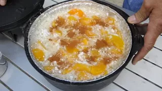 Peach Cobbler in a camp dutch oven