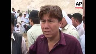 4:3 Burials of some of the victims of Sunday's twin blasts near Shiite mosque