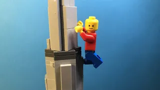 lego man climbs the Burj Khalifa