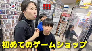 Korean family visiting Japanese game shop lol