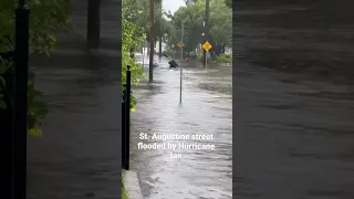 Boaters making due on a street flooded by Hurricane Ian Wednesday in St. Augustine, FL.