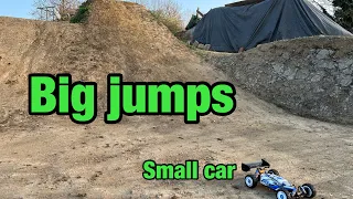 Wltoys 124017 small car big jumps