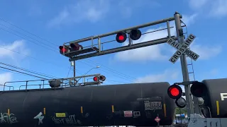 Northbound Union Pacific mix freight train at Oltorf Street in Austin Texas plus mid DPU