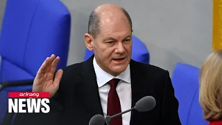 Olaf Scholz takes over from Angela Merkel as Germany's Chancellor