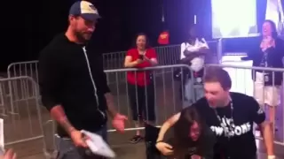 CM Punk watches two WWE fans get engaged at WrestleMania Axxess