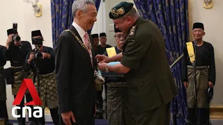 PM Lee, Ho Ching receive awards from Johor Sultan
