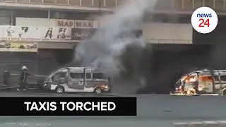 WATCH | Four minibuses torched in Joburg CBD as taxi violence erupts