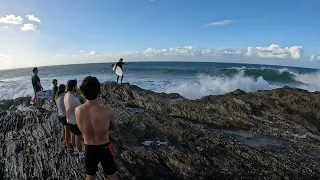Raw Footage: Surfer Jumps off Rocks at Snapper Rocks, Australia