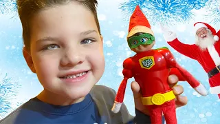 ELF on the SHELF Turns into SUPERHERO! Caleb and MOMMY Talk to SANTA with NORTH POLE Communicator!